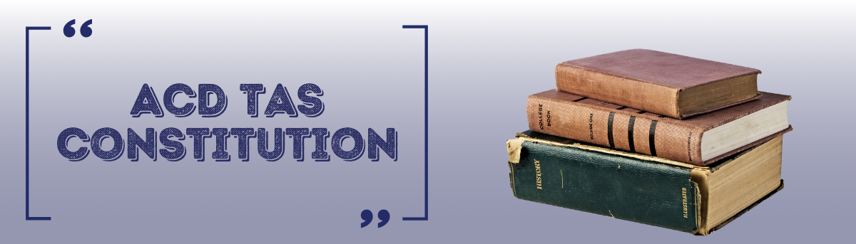 Text: ACD Tas Constitution  Image: Pile of old books
